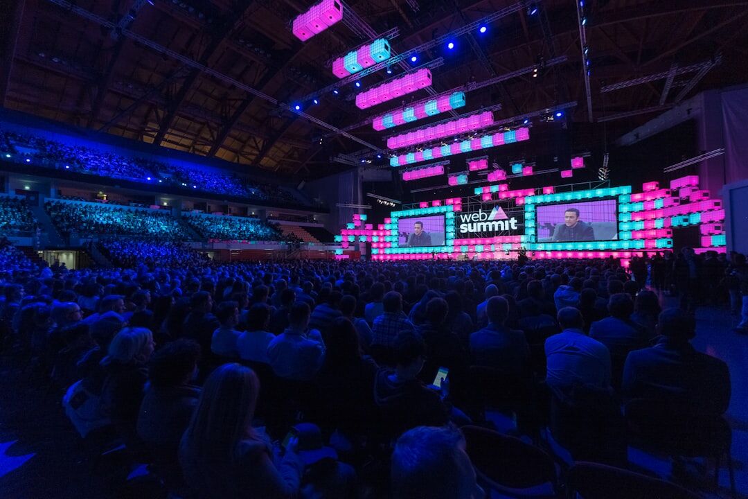 Business summit conference room full of attendees
